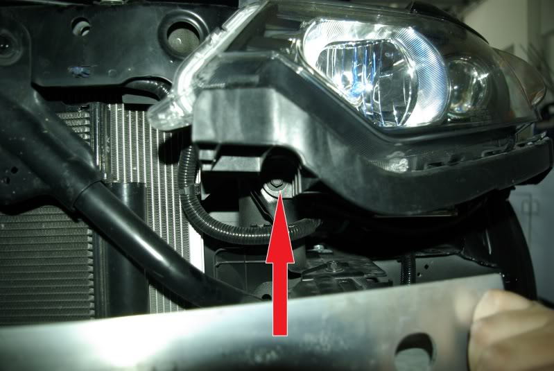 removing 10mm bolt from headlight