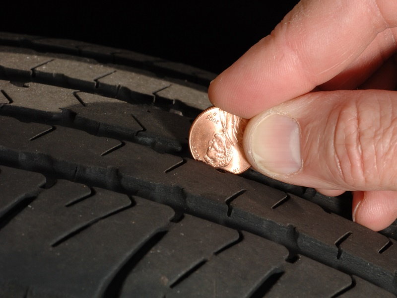 Inspect the tires tread and check for wears and unfamiliar objects. A penny can be used to see how much tread is left.