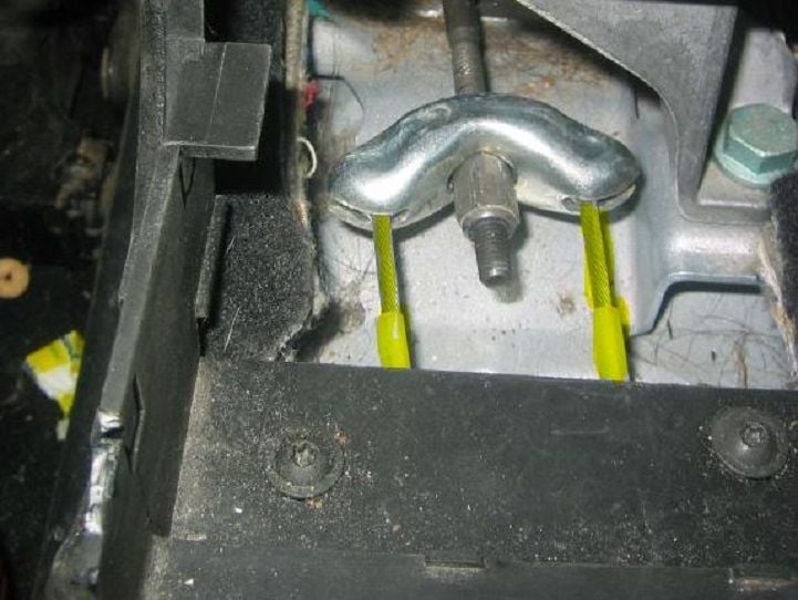 With the new brake lines connected, tighten the 10 mm adjustment nut until the rear wheels are difficult to turn by hand
