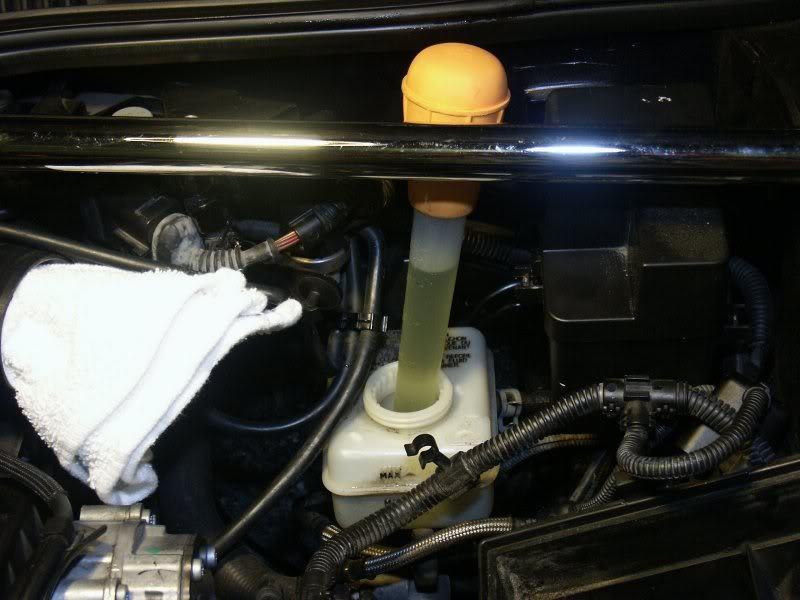 Remove most of the fluid from the master cylinder