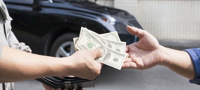 two hands exchanging money