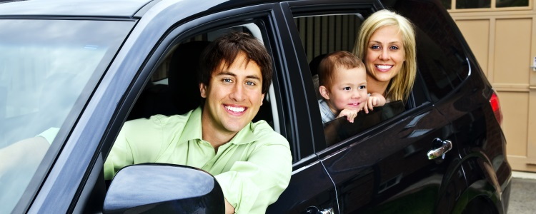 happy family in SUV, family sitting in car