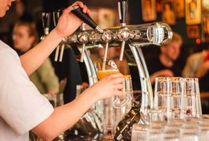 Beer being poured from a tap