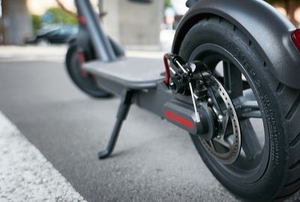electric scooter back tire from the ground