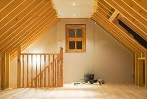 An attic in the middle of a conversion project.