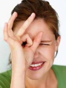 Image of a woman squinting.