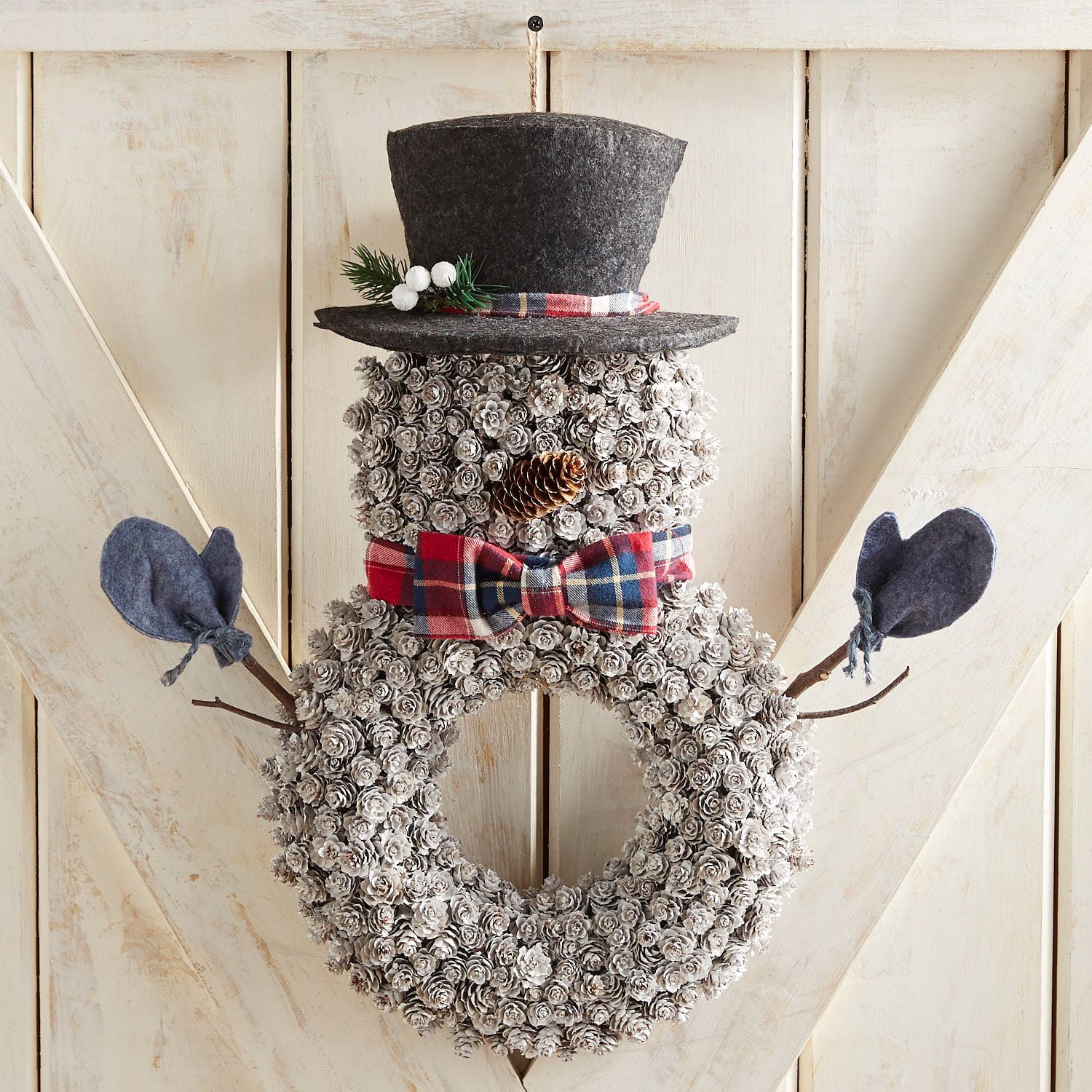 snowman wreath made from pine cones