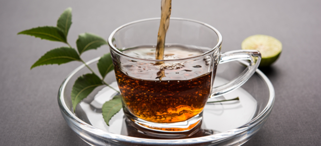 pouring liquid into a glass cup