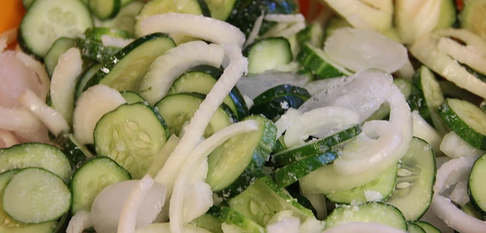 sliced cucumbers, onions and ice