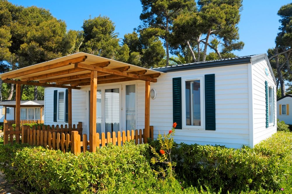 A mobile home with windows.