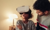 young girl with VR glasses next to smiling man