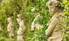 Old statues enveloped by hedges in the Villa Sciara,Rome, Italy