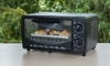 black toaster oven with crossiants inside