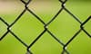 Close-up shot of a chain-link fence.