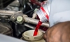 Transmission fluid being poured into an automobile.