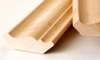 loose strips of wooden crown molding