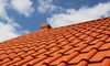 A home roof covered in clay tiles.