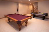 carpeted basement recreation room