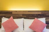 Pillows and bed headboard