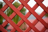 red lattice fence for deck
