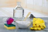 A grouping of cleaning products on a counter. 