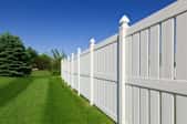 How to Mount a Vinyl Fence to Concrete
