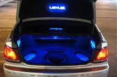 The inside of a car trunk and its back lights.