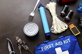 emergency supplies like tools, rope, and a first aid kit