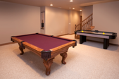 Brand New Game Room With Pool and Air Hockey Tables and Berber carpeting
