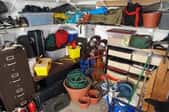 A cluttered basement that needs organizing.