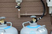 propane tanks connected to exterior gas system
