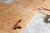 concrete basement floor with plywood subfloor materials