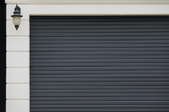 A gray garage door. 