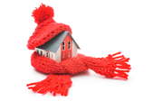 A house wrapped up in a scarf and hat.