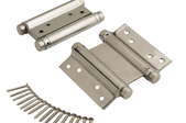 A close shot of multiple two-way spring hinges one a white background, with screws.