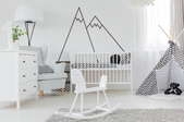 Wall decals that look like a mountain.