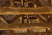 The rafters of an old attic.