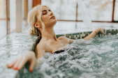woman sitting in a hot tub