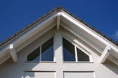 A roof gable with fascia boards facing outward.