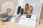 A trowel and other equipment.