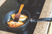 food cooking in a skillet on the stove