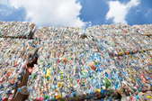 Stacks of plastic bottles waiting to be recycled. 