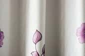 white curtain with purple flower print