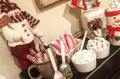 A hot chocolate bar decorated with snowmen. 