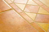 Ceramic tile on the floor.