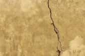 How to Repair Cracks in an Interior Stucco Wall