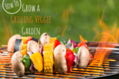 A BBQ with a flame and vegetable kabobs. 