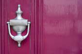 A knocker on a door.