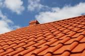 A home roof covered in clay tiles.