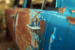 old rusty car door